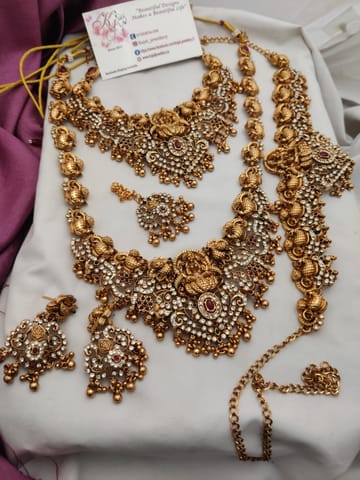 Lakshmi semi set golden with white stones